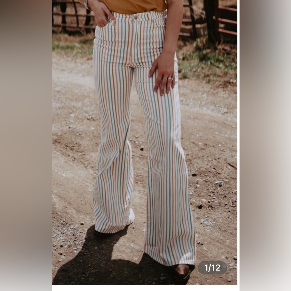 Worn once. Stripped high waist, flare jeans.